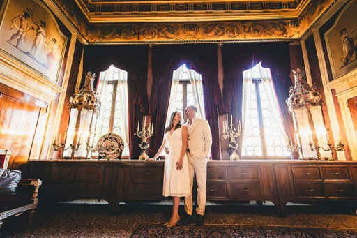 Bride and groom portrait in front of a historic Tuscan countryside villa