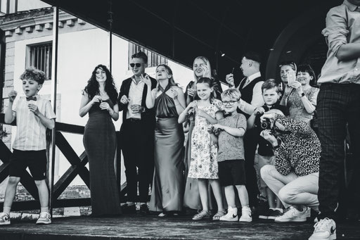 Destination wedding ceremony in Tuscany surrounded by rolling hills