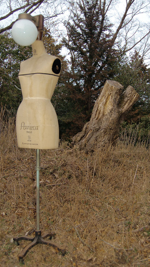 Antique torso lamp stand