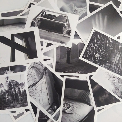 photographs spread on the floor