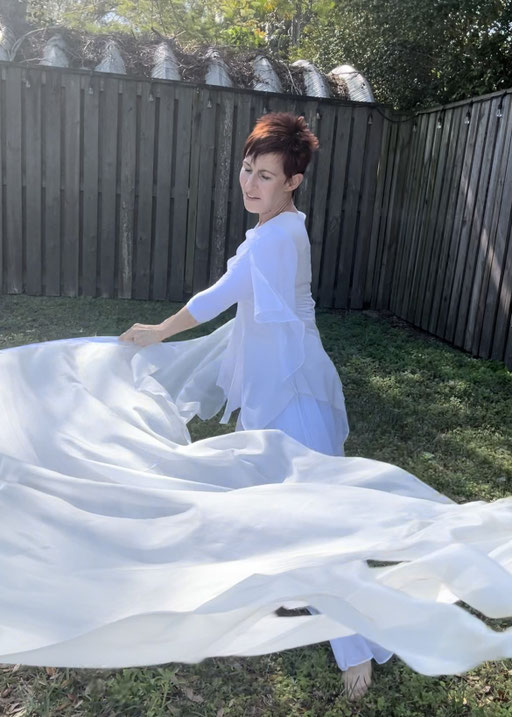 white flags with curved shape and feathered ends
