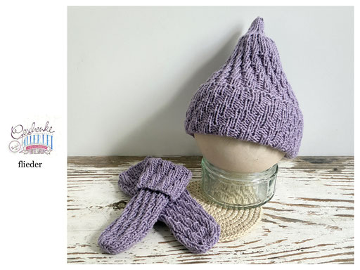 handgestrickte Babyaccessoires - Socken und Mütze in Spiralmuster in flieder