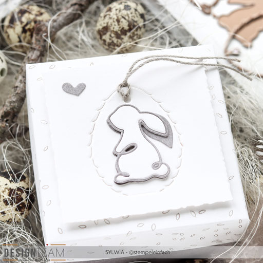 Box mit Hase und Botschaft 