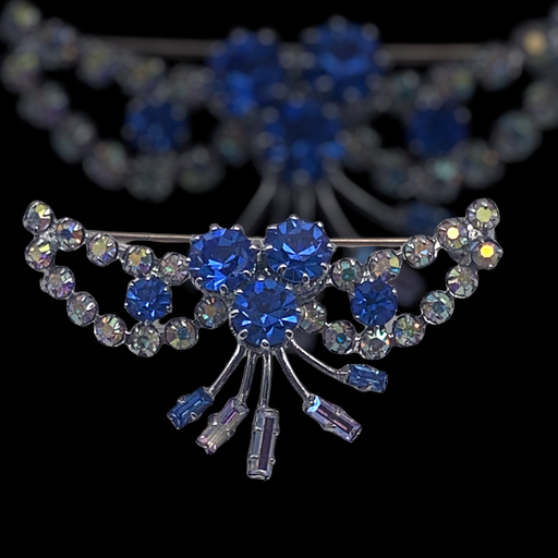 Lovely festoons-shaped 1950s brooch with prong set rhinestones in vibrant blue and AB- Very good Quality - Art.173/2