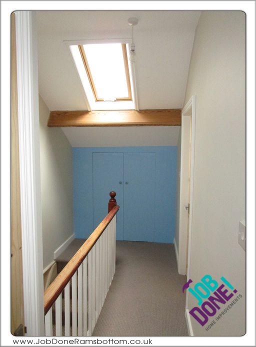 Loft landing area; hung and fitted new doors and decorated.