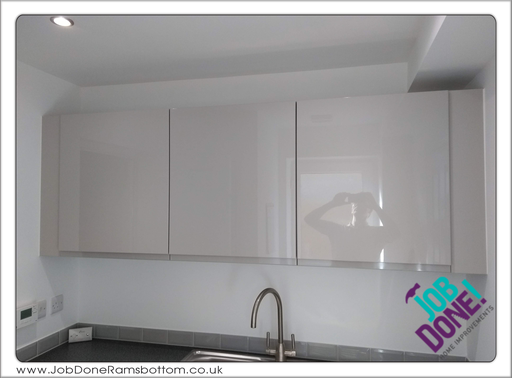 Kitchen wall units; added wall units to an existing utility room.