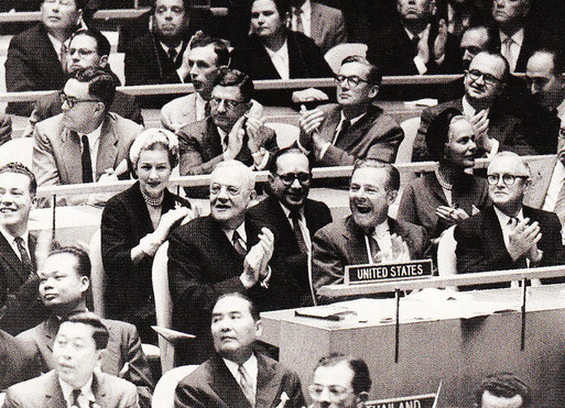 Madam Delegate - Appointed in 1957 by President Eisenhower as a delegate to the 12th General Assembly of the United Nations, Dunne, in the white hat, takes her seat behind Secretary of State John Foster Dulles