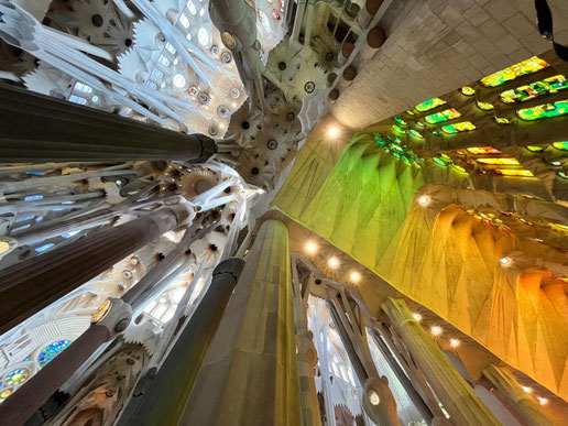 Interior of the Sagrada Família looking up, columns and stained glass light, Barcelona