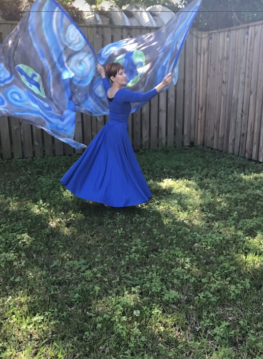 Blue swirls and an image of earth on silk flags