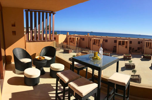 Apartment terrace in Ibiza, equiped with chill out furniture and views to the sea