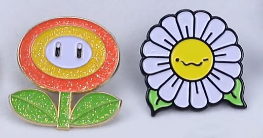 tre spille con la faccina emoji e il logo 1000spille