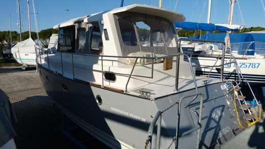 Stern with stainless steel ladder of the semi displacement and fuel efficient trawler