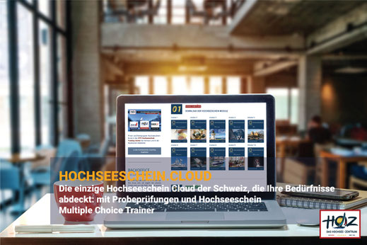 Laptop mit der HOZ Hochseeschein Claud auf dem Bildschirm in einer modernen Café Umgebung