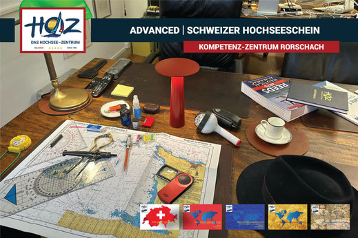 Navigationstisch mit Seekarten, Navigation und Kursmaterial im Kompetenz-Zentrum Rorschach, Theoriekurs Schweizer Hochseeschein.