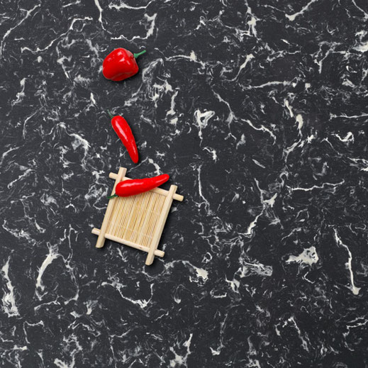 black engineered quartz with white stains