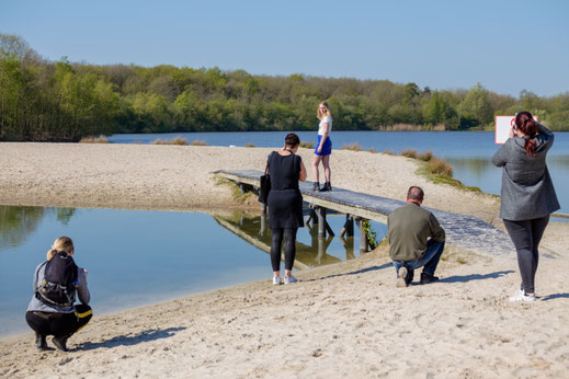 fotograferende deelnemers tijdens workshop