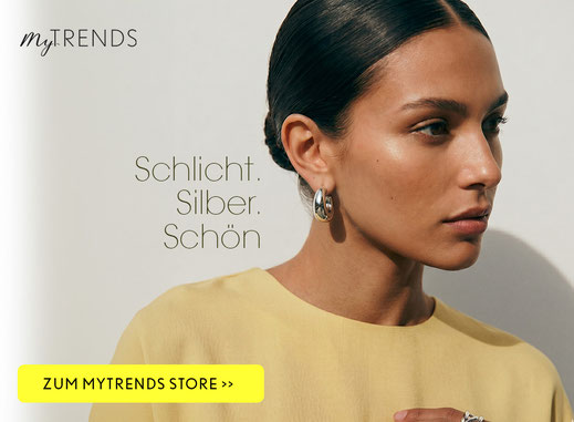 Frau trägt die Schmuck Trends vom Frühling 2026