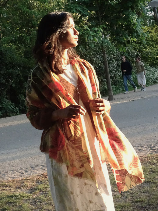 Lightweight wool shawl nature motif woman outfit.