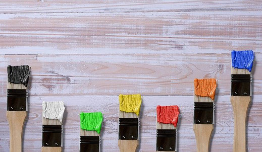 paint brushes different colour paints