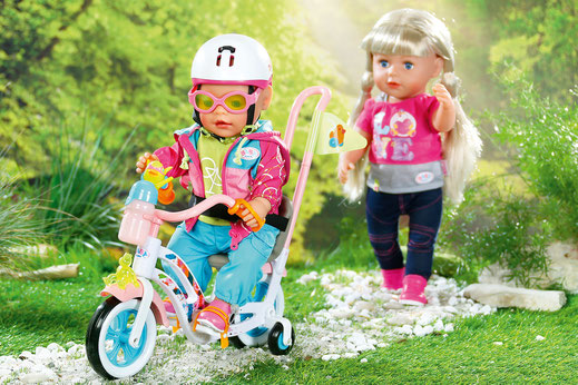 Rollenspiele im Freien machen Kindern Spaß: Ihre Babypuppe können Puppenmamis auf dem neuen Rad mit Lenkstange durch die Gegend schieben. Foto: djd/Zapf Creation AG