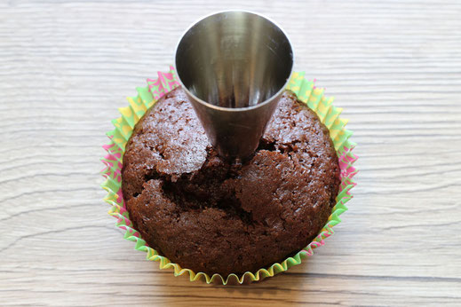 use wilton tip 1M and 2A to cut out hole in chocolate cupcake