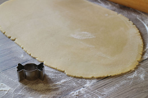 cutting out candy shaped cookies