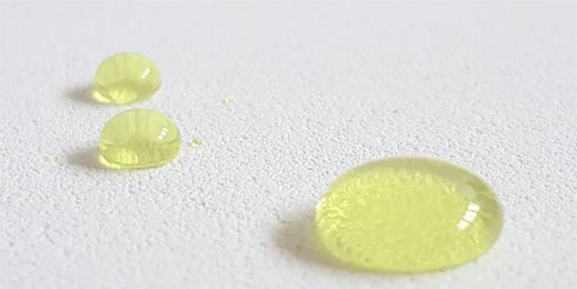 White wine drops on a fluraphon top surface