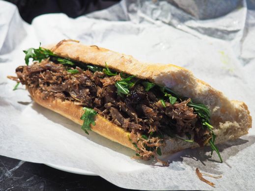 French baguette, duck meat chunks and French mustard