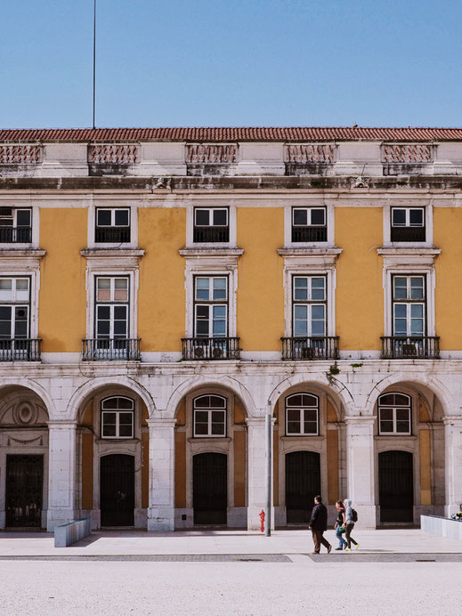 Praça do Comércio and its yellow buildings