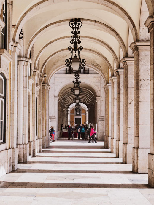 The beautiful arcades in Praça do Comércio