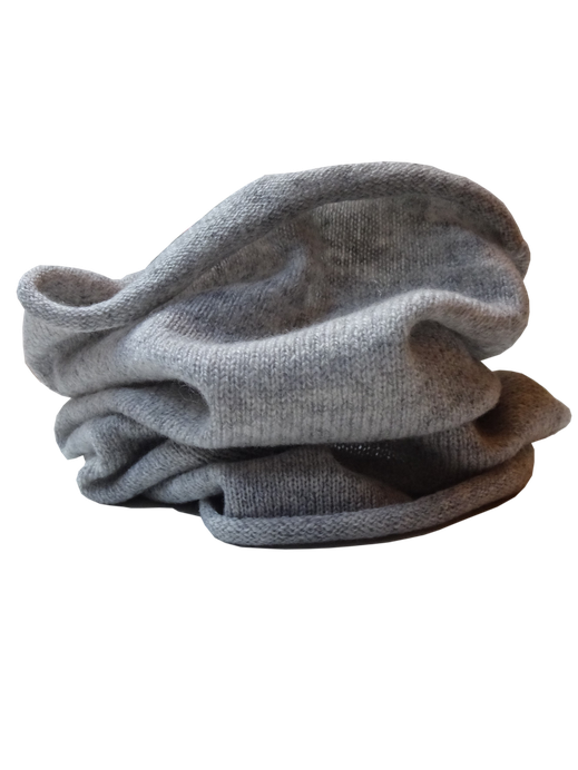 Pure cashmere neckwarmer in smooth knit – soft unisex winter accessory. Isolated