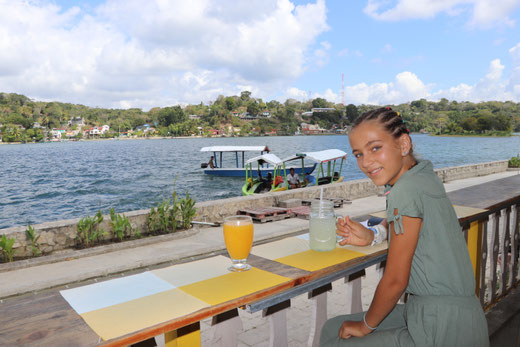 Having drink on the island of Flores, Guatemala