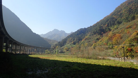 We followed the road under the highway when we entered the mountains of Southern Gansu.