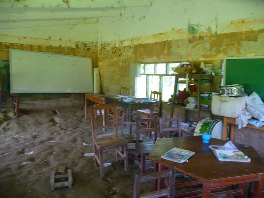 The local communities school house that had been destroyed in a storm, children still come to school here everyday