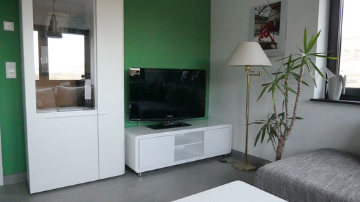 Wohnzimmer mit Fernseher