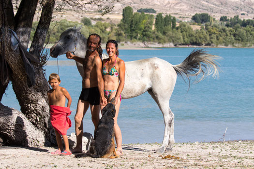 Pablo, Nico and Helene with one of their horses plus dog