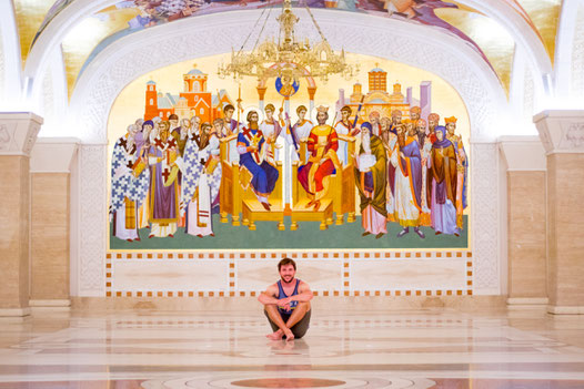 Bastian sitting in Belgrades church