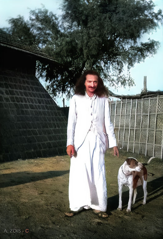  12.  Meher Baba at Upper Meherabad, India with his dog Chum in 1935.