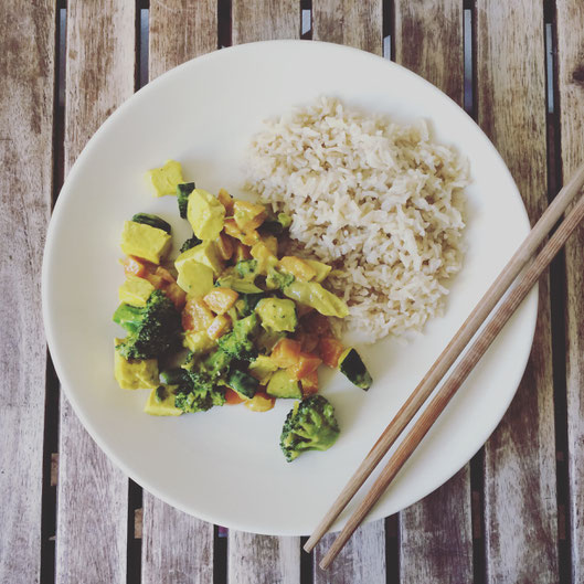 Vegetable Coconut Curry and Brown Rice on a plate