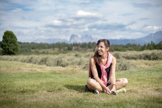 Irene with view to Langkofel und Plattkofel, part of the Dolomites in South Tyrol, Italy