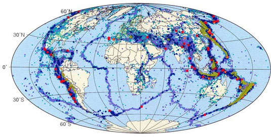 Carte mondiale des séismes (zones bleues) et des volcans en activité (points rouges).