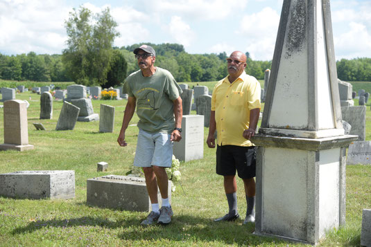 Jim Corpin and Max Smith, co-chairs of the 15th Annual Peterboro Emancipation Days, lead the annual procession and tour of the Peterboro Cemetery in 2022.