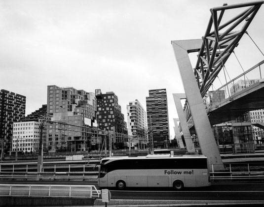 barcode high-rise buildings and a bus
