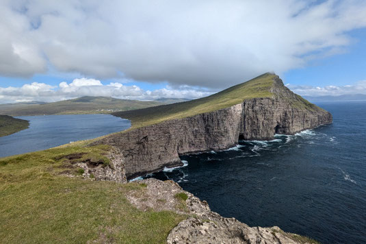 The Lake above the Ocean on the Faroe Islands, hiking, cliffs, hiking trails on the Faroe Islands