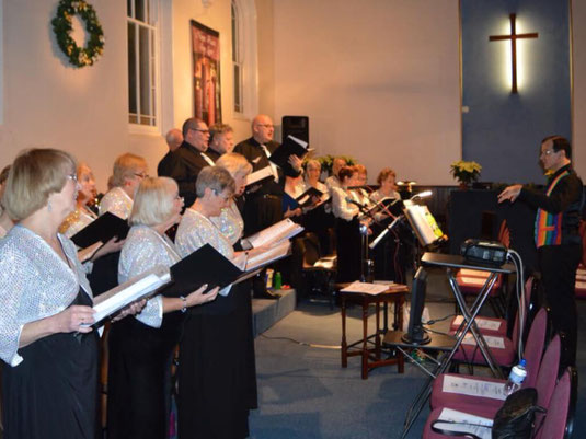 Music Director of the Wessex Chorus conducting at the MCC Christmas Concert.