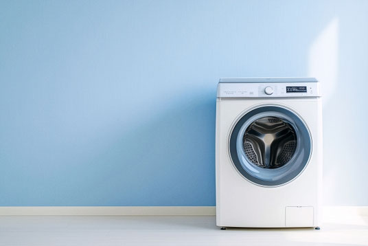 ドラム型の洗濯機。家事負担。