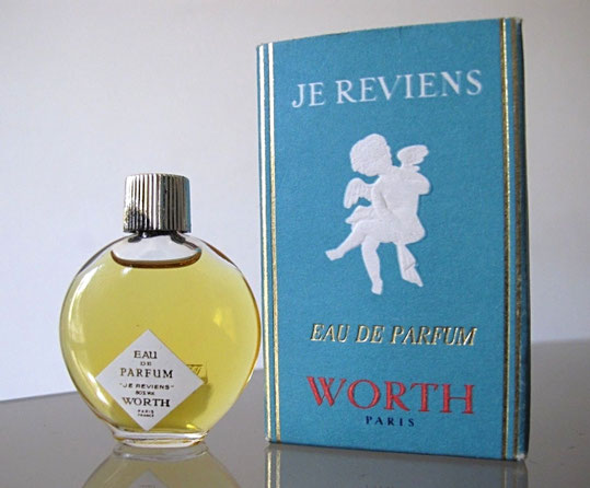 JE REVIENS - EAU DE PARFUM, PETITE MINIATURE TYPE "MONTRE" EN VERRE TRANSPARENT, DIFFERENTE DE LA PHOTO PRECEDENTE - ETIQUETTE BLANCHE