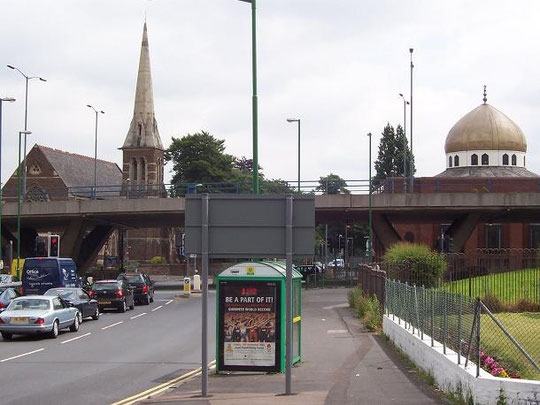 Holy Trinity Church and the Jame Masjid Mosque, Trinity Road. © Copyright Adrian Bailey and licensed for reuse under Creative Commons Licence: Attribution-Share Alike 2.0 Generic. Geograph OS reference SP0690. See Acknowledgements.