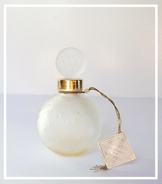 WORTH - JE REVIENS EAU DE TOILETTE : FLACON BOULE ETOILEE, CREATION LALIQUE.