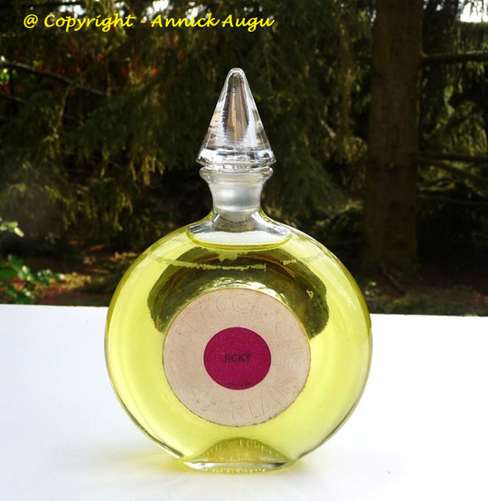 1889 - JICKY : EAU DE COLOGNE, FLACON DIT "FLACON PNEU" - BOUCHON POINTU EN VERRE